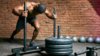 Man-Pushing-Weighted-Sled-Prowler.jpg