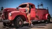 sing-in-daisy-dukes-nest-to-a-rusty-old-fire-truck.jpg