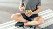 Man-Sitting-On-Bench-Eating-Salad.jpg