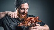 Hungry-Bearded-Man-Eating-A-Bucket-Of-Bacon.jpg