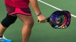 playing-pickleball-and-holding-a-pickleball-paddle.jpg