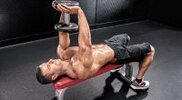 Muscular-Topless-Male-Performing-Lying-Dumbbell-Pullover-Starting-Position